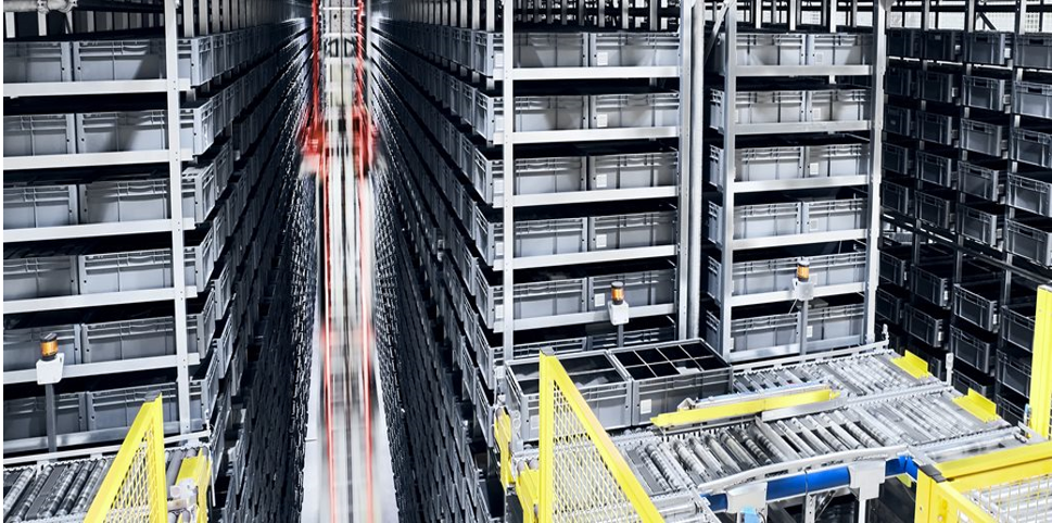 a large building with a red and yellow crane