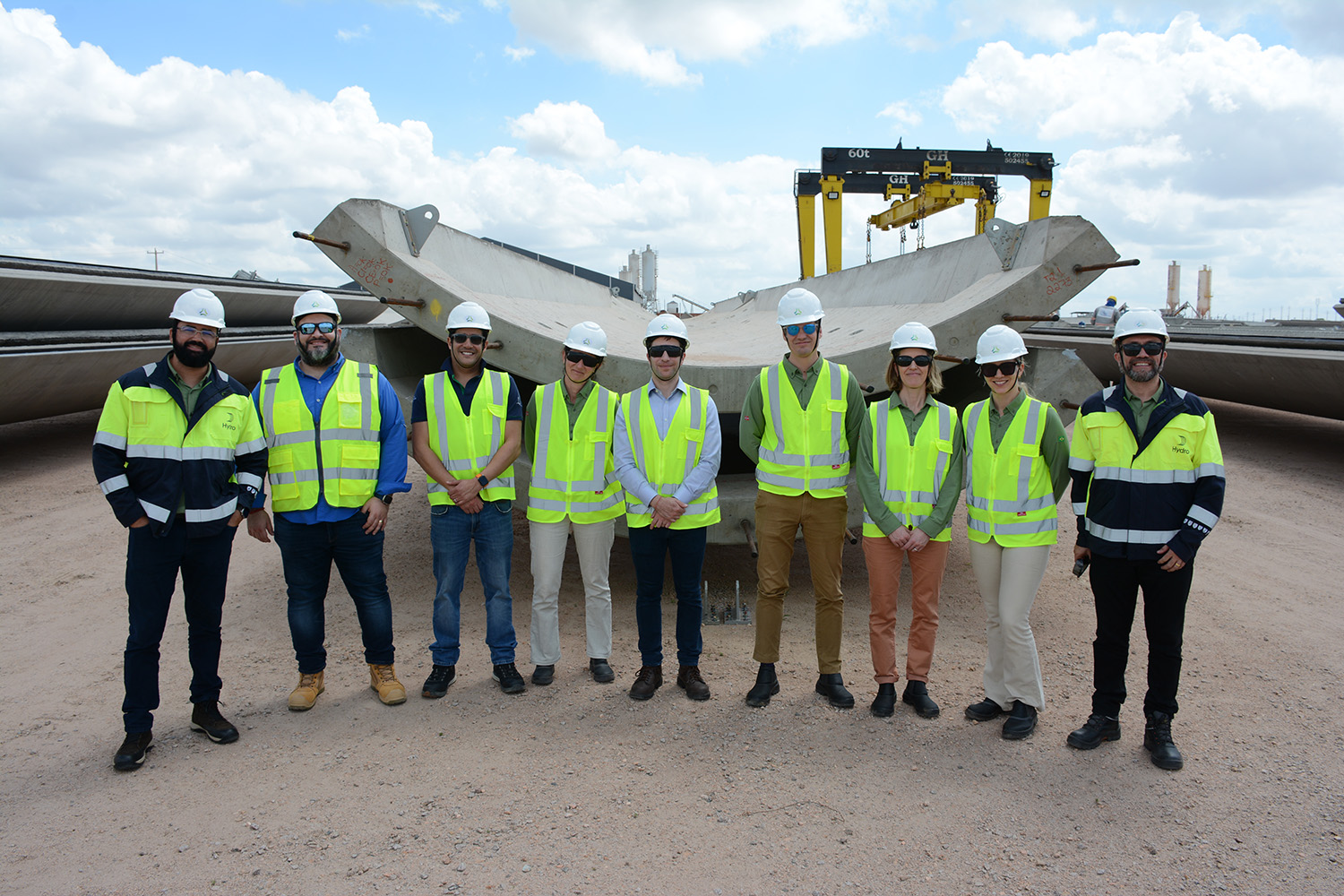 a group of people wearing safety vests
