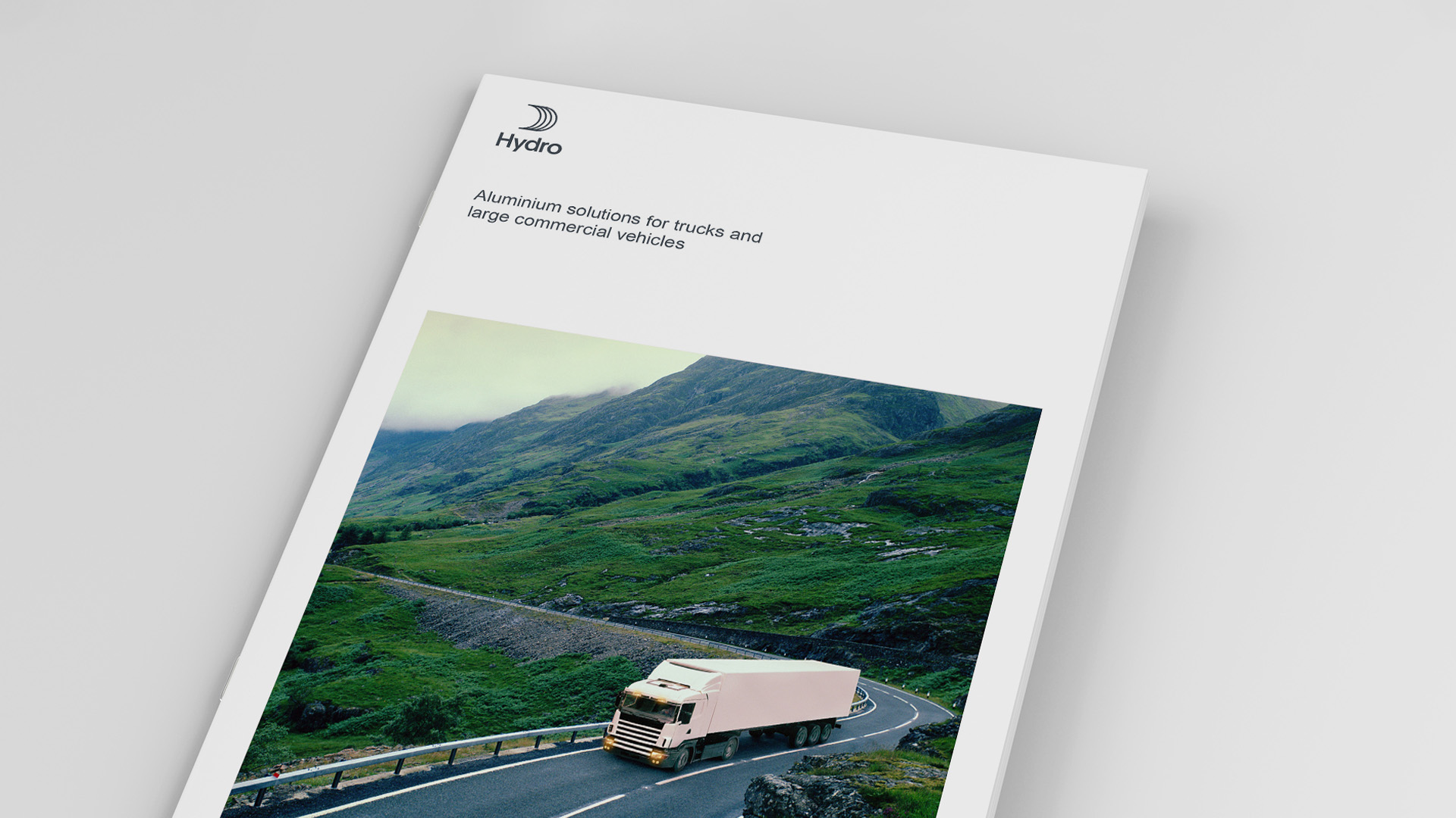 a brochure of a truck driving on a road