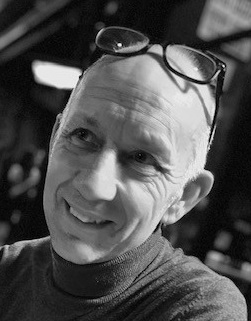 a man wearing glasses on his head